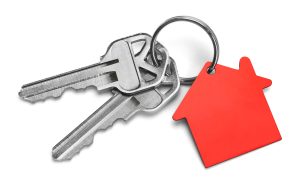 Keys on a red house-shaped keychain